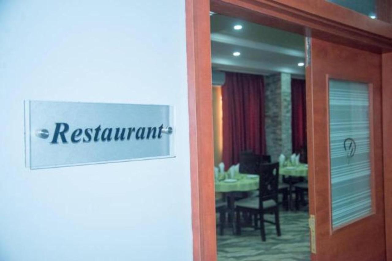 Dannic Hotels Енугу Екстериор снимка
